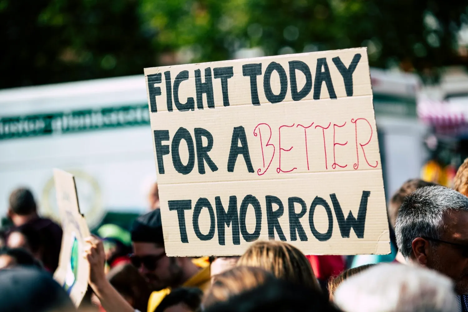 Protest banner saying 'fight today for a better tomorrow'