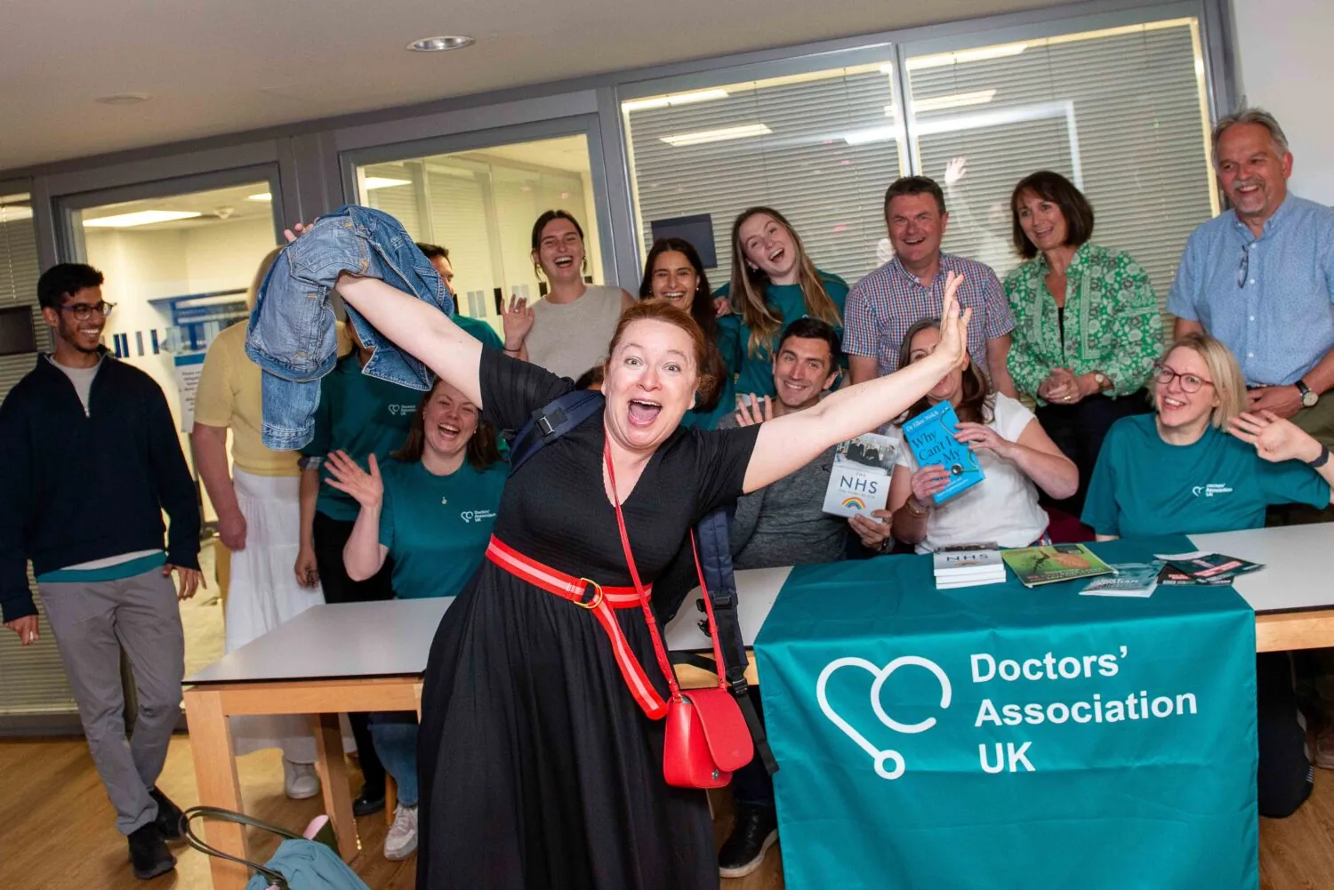 Keynote speaker Dr Rachel Clarke photobombs a group photo at the end of the DAUK conference