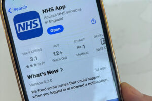 Person accessing NHS app on a smartphone. DAUK’s GP committee continues to raise concerns about changes to online access at GP surgeries.