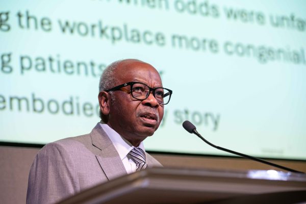 Dr David Sellu delivering a lecture