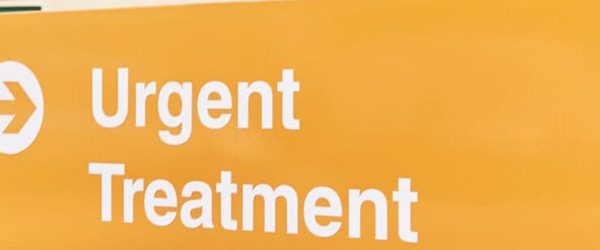 Sign directing patients to urgent treatment