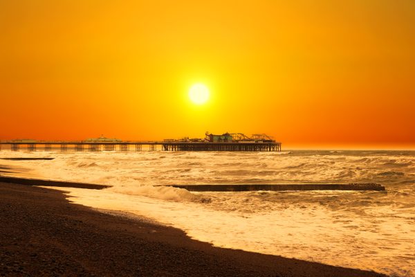 Image of sun setting over the sea